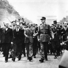 Gen. Charles de Gaulle leads a victory parade down the Champs Elysee in Paris