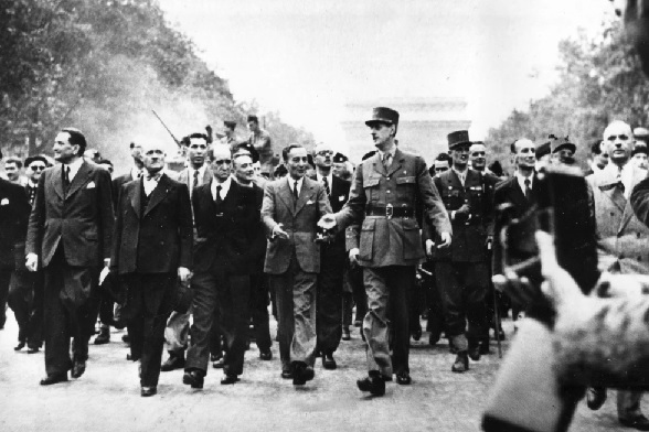 Gen. Charles de Gaulle leads a victory parade down the Champs Elysee in Paris