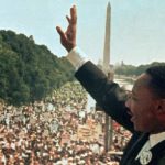 Dr. Martin Luther King Jr. acknowledges the crowd at the Lincoln Memorial for his “I Have a Dream” speech