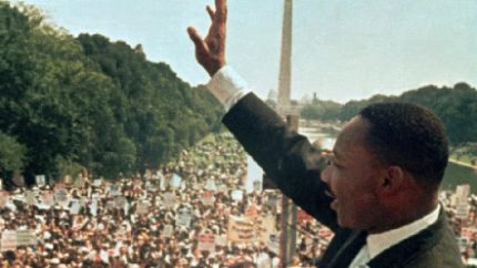 Dr. Martin Luther King Jr. acknowledges the crowd at the Lincoln Memorial for his “I Have a Dream” speech