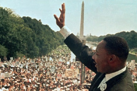 Dr. Martin Luther King Jr. acknowledges the crowd at the Lincoln Memorial for his “I Have a Dream” speech