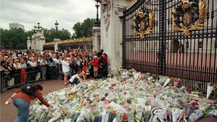 More flowers on the pile outside the gates of Buckingham Palace following the death of Diana, Princess of Wales.