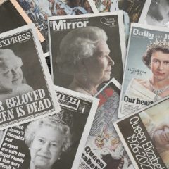 Newspapers devoted to the death of Queen Elizabeth II are seen in Manchester, England