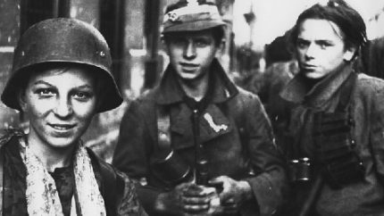 Tadeusz Rajszczak 'Maszynka', Ryszard Michał Lach, and one other young soldier from 'Miotła' Battalion in Warsaw Uprising