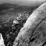 Drillers work on the George Washington head of the Mount Rushmore Memorial