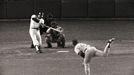 Reggie Jackson hits the first of his three home runs in the fourth inning of Game 6 of the 1977 World Series (AP Photo)