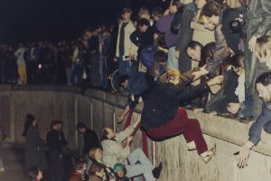 East German citizens applauded by West Berliners when they cross Checkpoint Charlie to visit West Berlin (AP Photo-Thomas Kienzle, File)