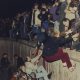 East German citizens applauded by West Berliners when they cross Checkpoint Charlie to visit West Berlin (AP Photo-Thomas Kienzle, File)