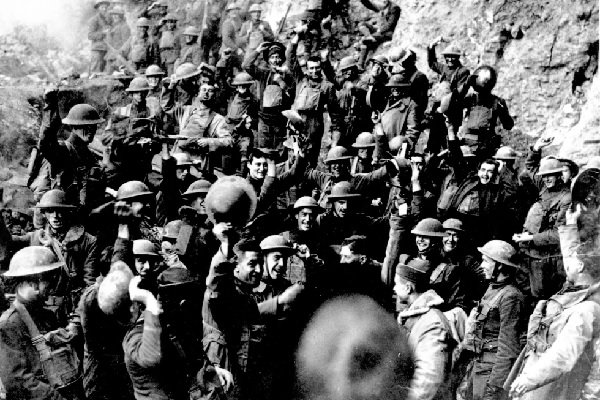 American troops cheer after hearing the news that the Armistice had been signed, ending World War I (AP Photo)