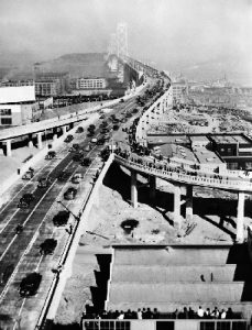 The first cars crossing the new San Francisco-Oakland Bridge after it was officially thrown open to traffic (AP Photo)