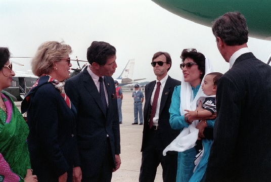 Prime Minister Benazir Bhutto, second from left, arrives in the US for a State Visit