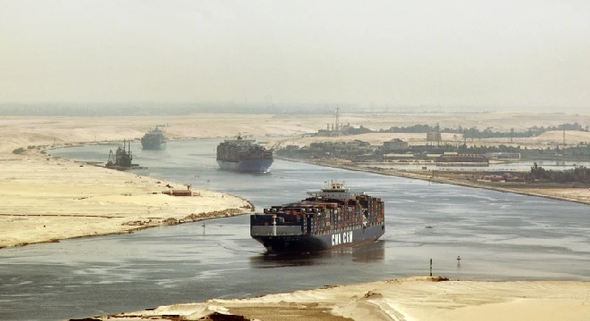 Cargo ships sail through the Suez Canal near Ismailia, Egypt (AP Photo, File)