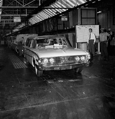 The last Edsel to be built, a tan station wagon, rolls off the Ford Motor Company assembly line (AP Photo- Littell)