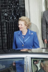 British Prime Minister Margaret Thatcher leaves her 10 Downing Street residence to inform Queen Elizabeth II of her decision to resign (AP Photo, Gerald Penny)