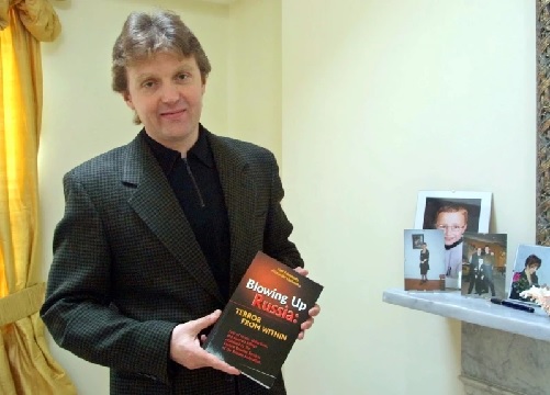 Alexander Litvinenko, former KGB spy and author of the book 'Blowing Up Russia - Terror From Within at his home in London (AP Photo-Alistair Fuller)