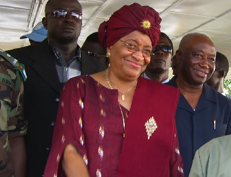  Liberian President elect Ellen Johnson-Sirleaf, center, after she gave an address to the nation in the city of Monrovia, Liberia (AP Photo-Pewee Flomoku)