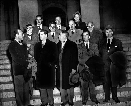 The 'Hollywood 10' stand with their attorneys before arraignment on contempt of Congress charges (AP Photo)