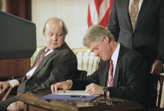 The President signed the Brady bill, named after James Brady, which would require a five-day background check on handgun buyers. (AP Photo - Doug Mills)