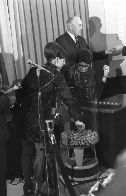 Judith Hillenbrand, a representative on a Committee of the Selective Service System, picks a capsule for the birth-date drawing of the 1970 draft lottery (AP Photo)