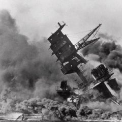 Smoke rises from the battleship USS Arizona as it sinks during a Japanese surprise attack on Pearl Harbor, Hawaii (AP File Photo)