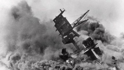 Smoke rises from the battleship USS Arizona as it sinks during a Japanese surprise attack on Pearl Harbor, Hawaii (AP File Photo)