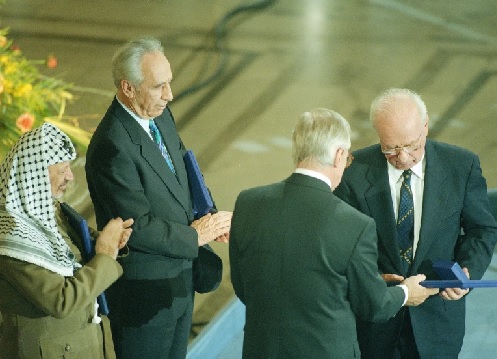 Yasser Arafat, a terrorist, Shimon Peres, a misguided Israeli politician, and Yitzhak Rabin joint winners of the Nobel Peace Prize (AP Photo - Jerome Delay)