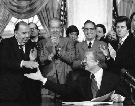 President Jimmy Carter after signing the environmental Superfund legislation in the Cabinet Room of the White House (AP Photo - Dennis Cook)