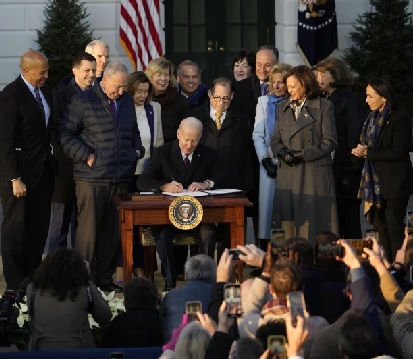 President Joe Biden signs the Respect for Marriage Act on the South Lawn of the White House in Washington (AP Photo - Andrew Harnik)