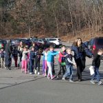 Children were told to close their eyes as they were guided to safety from the school building (uncredited)