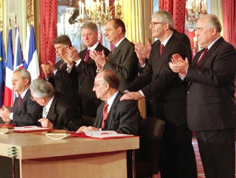 World leaders at signing of the treaty to bring peace in the Balkans’ at the Elysee Palace in Paris (AP Photo,Jerome Delay,pool)