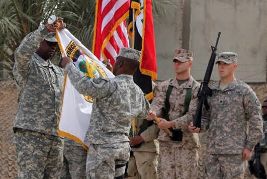 Flaq ceremony. Flags came dowm to mark the end of Iraq war