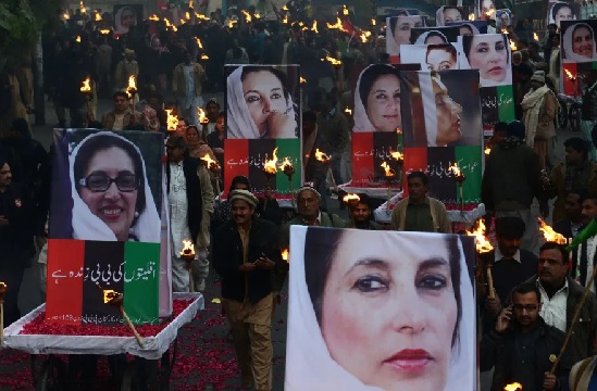 Supporters of Benazir Bhutto gather on the anniversary of Bhutto’s assassination, at a rally in Lahore