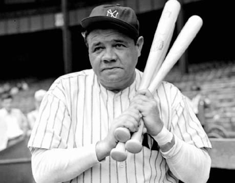 Babe Ruth in Yankees uniform and signature three bats