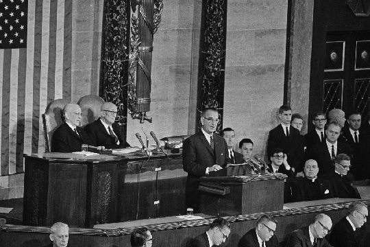 Speaking to a joint session of Congress, President Lyndon B Johnson said one of his aims was unconditional war on poverty in America (AP Photo)