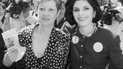 Norma McCorvey, who was Jane Roe in the 1973 Roe v Wade case, with attorney, Gloria Allred, outside the Supreme Court in April 1989 (Photo via the Associated Press)