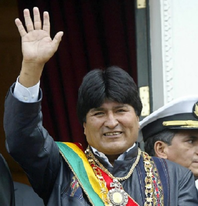 President Evo Morales waves from the Presidential Palace balcony