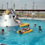 Prime crew members for the first manned Apollo 1 space flight practice water egress procedures in a swimming pool