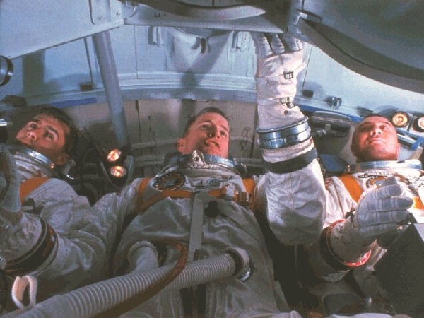 Roger B. Chaffee, Edward H. White and Virgil I. Grissom practice for the mission in the Apollo Mission Simulator