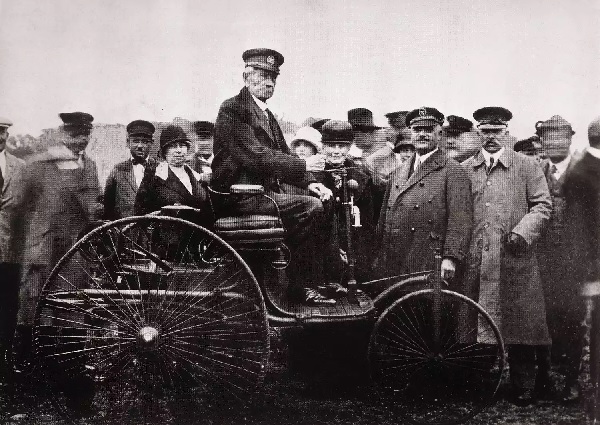 Inventor Karl Benz seated on the 1885 Benz Motorwagen, the world's first practical automobile 