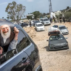 Families make their way home on Friday after the announcement of a cease-fire in Lebanon.Credit...David Guttenfelder/The New York Times