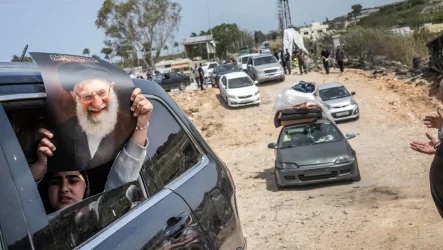 Families make their way home on Friday after the announcement of a cease-fire in Lebanon.Credit...David Guttenfelder/The New York Times